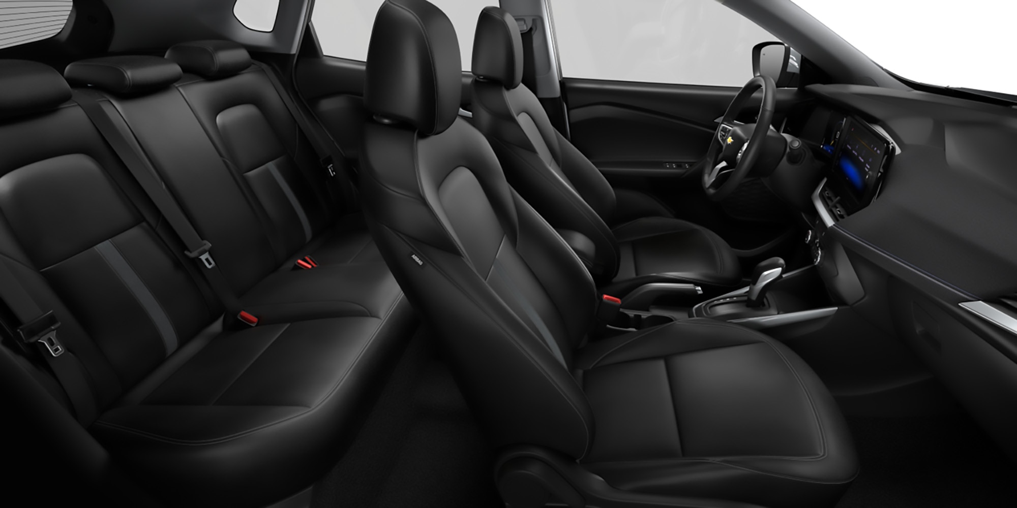 Interior negro, vista lateral, con asientos ergonómicos y acabados de alta calidad.