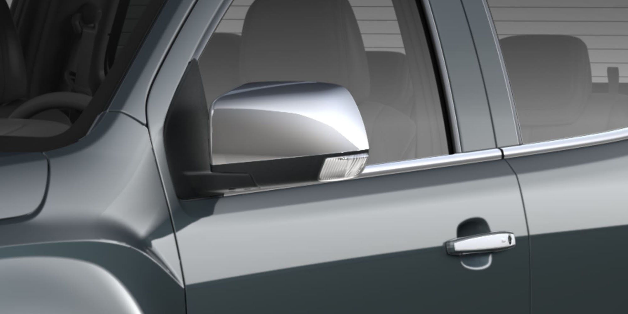 Detalle del retrovisor del conductor de la Chevrolet Colorado gris